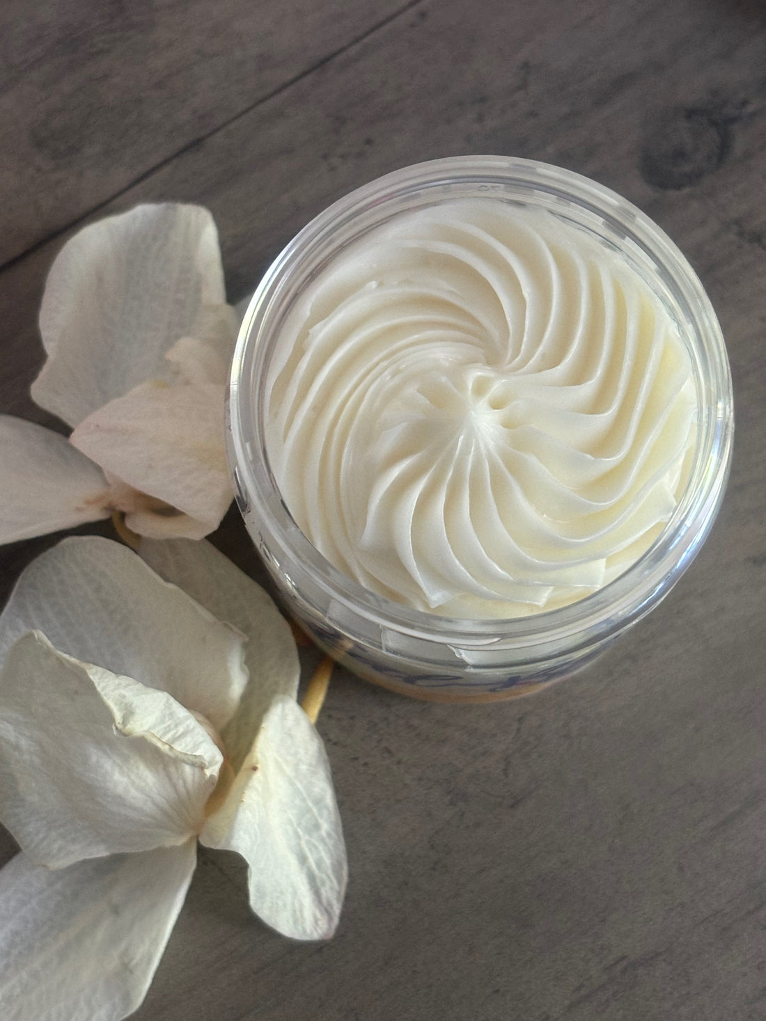 "Real Blew Cosmetics' Vanilla Cake Batter Whipped Body Butter - deeply hydrating, creamy formula with a sweet, warm aroma of freshly baked vanilla cake. Perfect for all skin types. Shop now for smooth, glowing skin