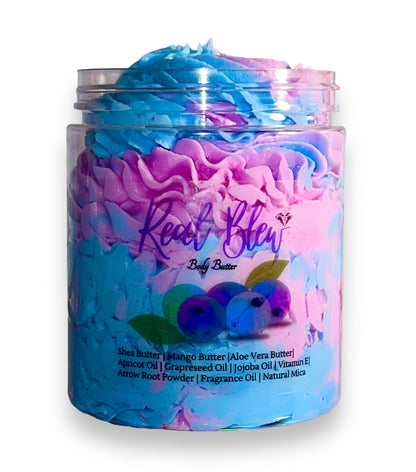 A clear jar with purple and blue swirled body butter inside, the outside has purple and blue berries on the front with "Real Blew" written in fancy letters looks AMAZING